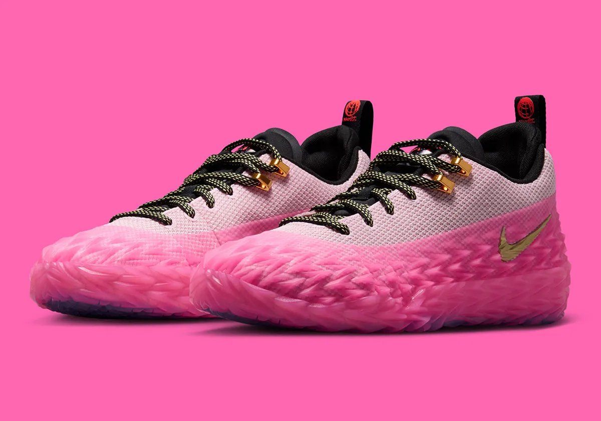 Nike ST Charge in Pink Foam colorway with gold accents and black collar detail