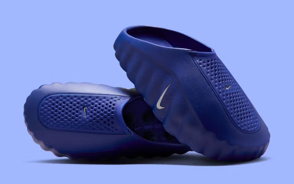 Nike Mind 001 in Old Royal blue colorway, side profile view of the mule-inspired silhouette