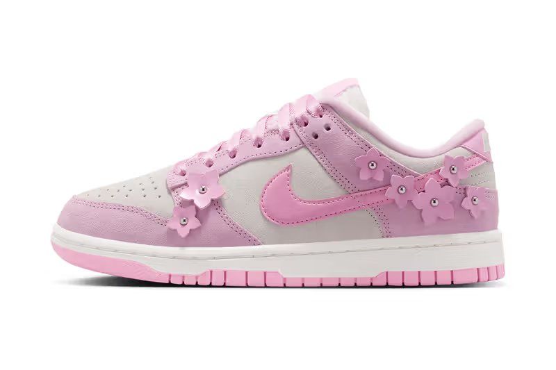 Nike Dunk Low SE Pink Rise with riveted heel hardware detail, soft pink suede upper