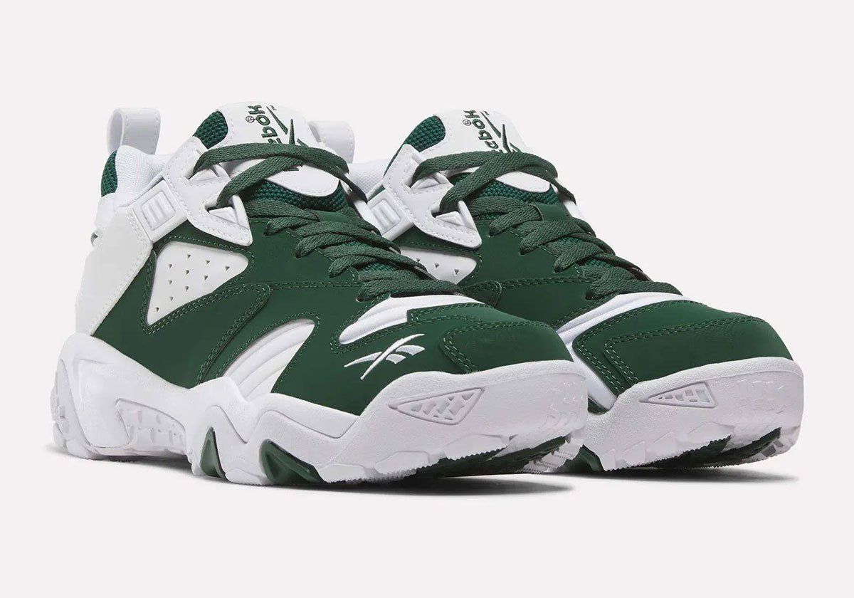 Reebok Brutus Lo in pine green and white Philadelphia Eagles colorway, showing side profile and detail of toe cap and tongue