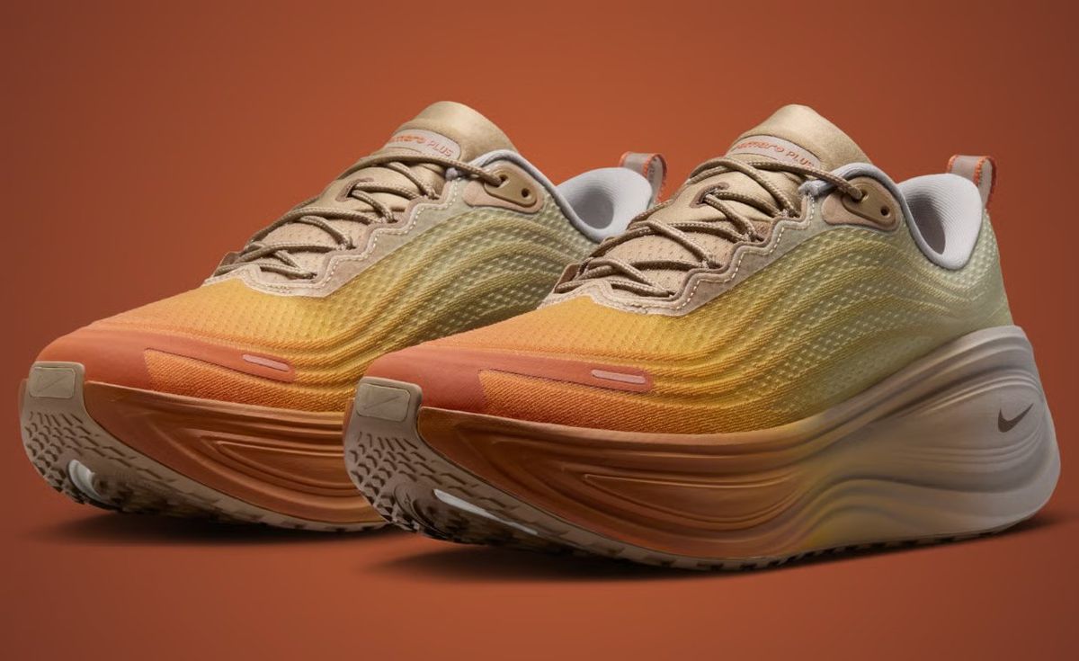 Nike Vomero Plus Cheat Day showing orange-to-grey gradient with Cheeto-inspired insole graphics