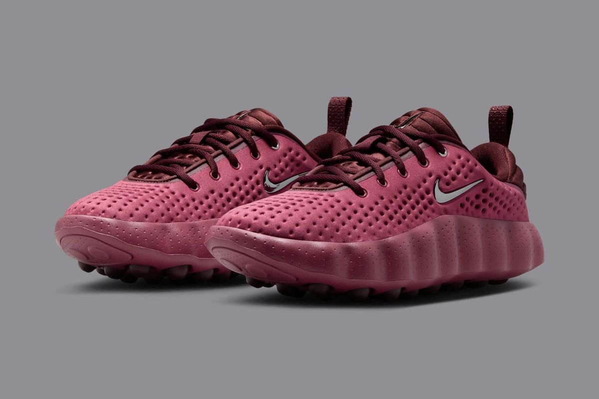 Nike Mind 002 WMNS Pink Smoke colorway featuring pink, mystic dates, and metallic silver accents