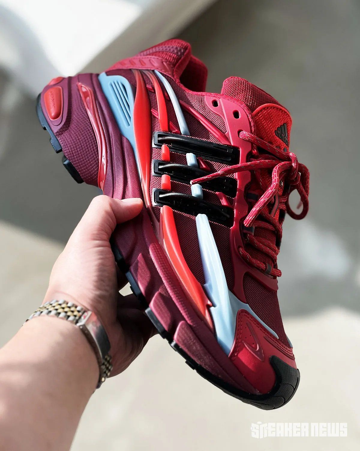 Pharrell's adidas VIRGINIA Jellyfish in red colorway with grey tentacle accents and black Three Stripes
