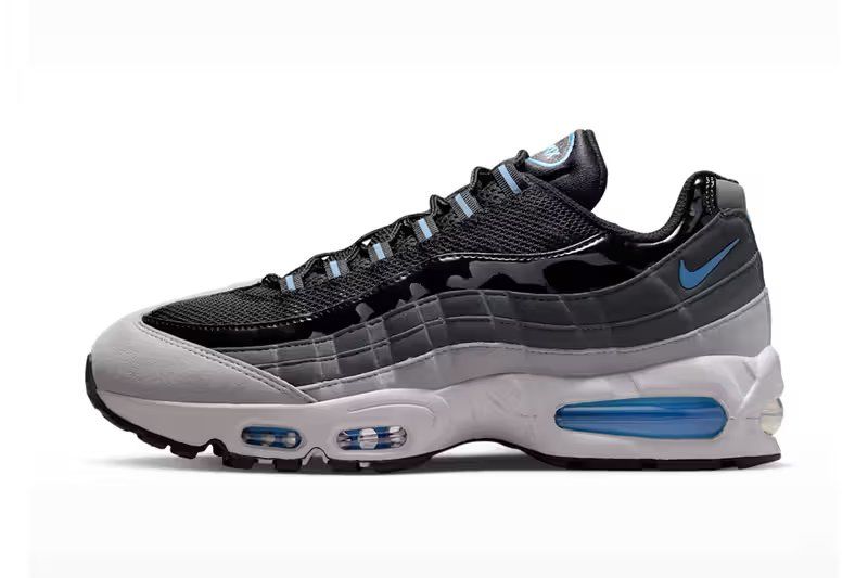 Nike Air Max 95 Black/Grey Fog showing dual Air Max units and anatomical paneling with football blue accents