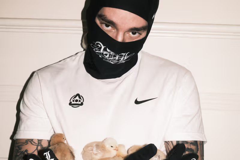 Nike x Yeat ADL collaborative collection featuring co-branded mask and collectible packaging
