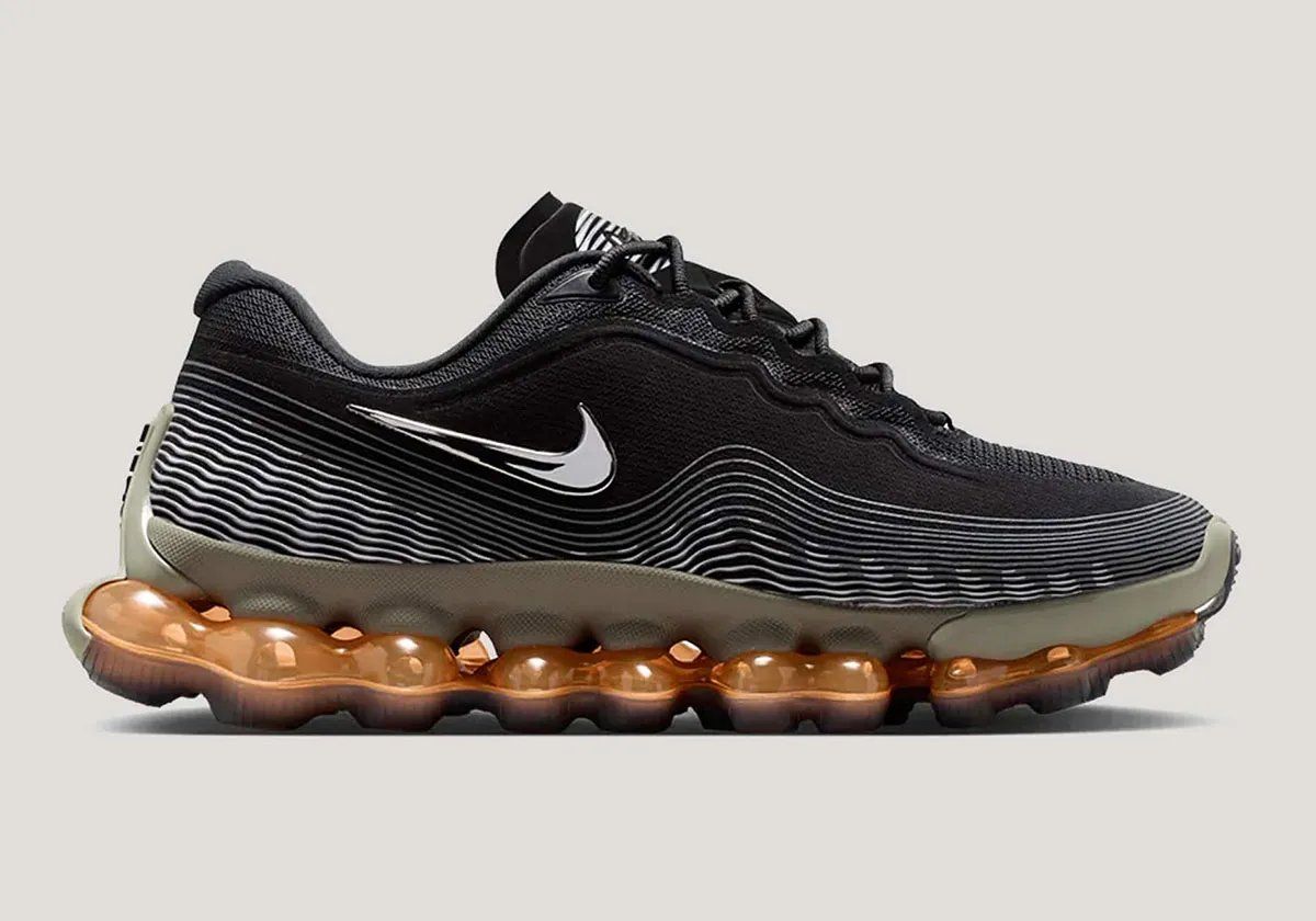 Nike Air Liquid Max Black Metallic with wavy line graphics and chrome Swoosh detail, lateral view