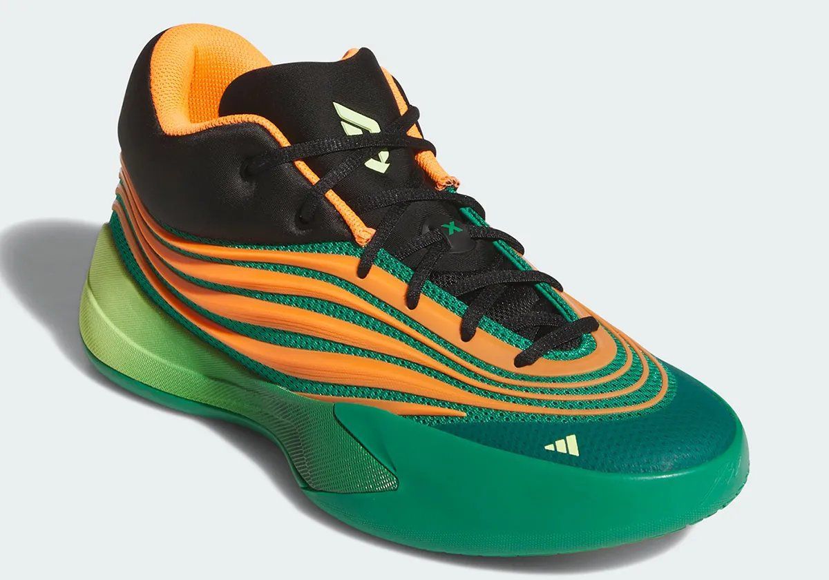 adidas Dame X "Meet the Moment" in black synthetic with orange trim and viridescent gradient sole, worn by Damian Lillard