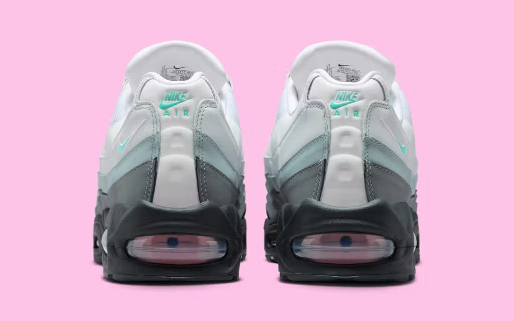 Nike Air Max 95 in Hyper Turquoise and Pink Foam colorway, showcasing the distinctive curved paneling and visible Air unit