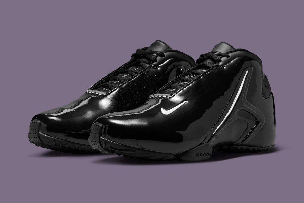 Nike Hyperflight Premium in all-black colorway, featuring premium construction and performance-forward silhouette design