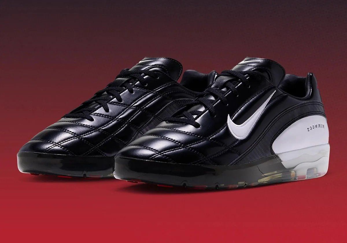 Nike Air Zoom M9 Cryoshot in black leather with white Swoosh and carbon fiber accents, honoring Mia Hamm's World Cup legacy