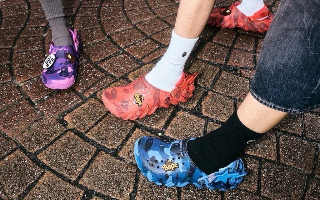 BAPE x Crocs Echo Clog collaboration featuring three camo-printed foam clogs in signature Bathing Ape camouflage colorways