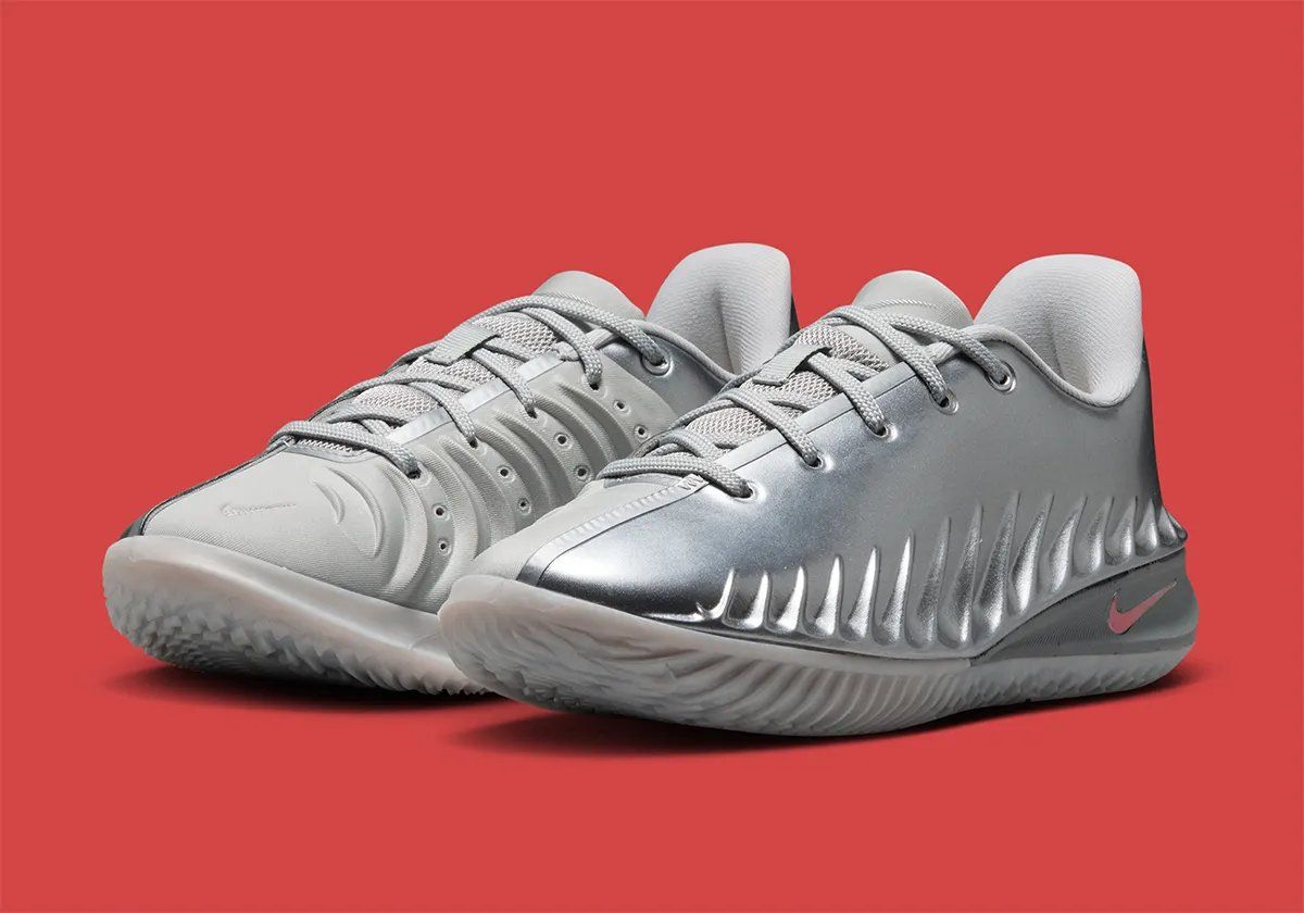 Nike GT Cut 4 in Metallic Silver colorway, full side profile view showing chrome-coated upper