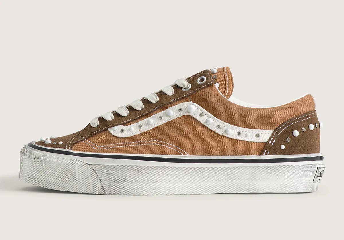 Vans Old Skool in Vintage Cocoa Brown with pearlized finish, showing side profile and iridescent detailing