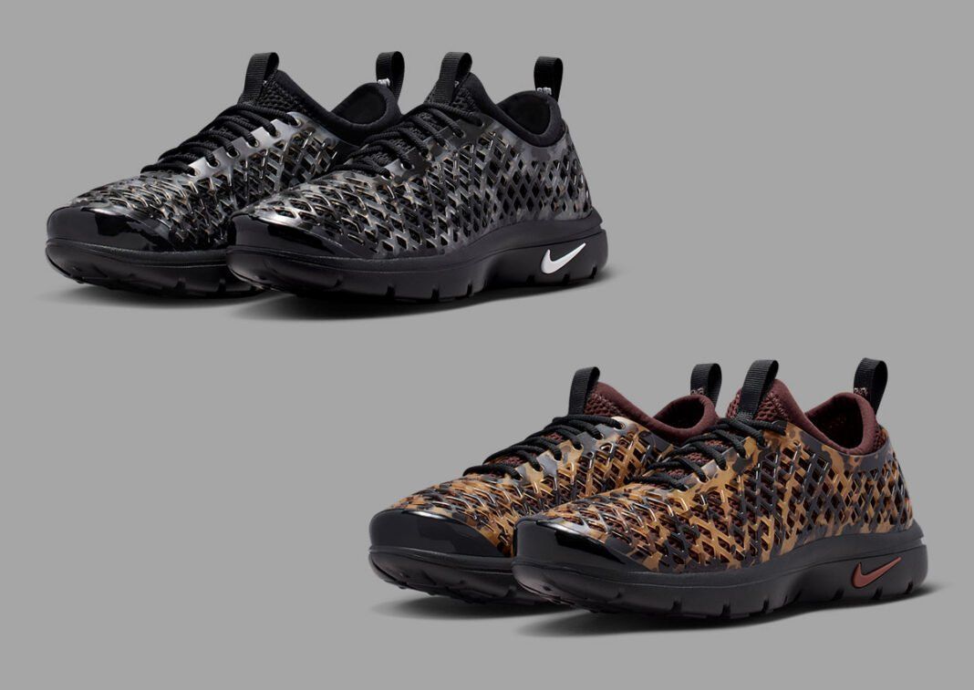 Nike Air Rejuven8 Black Camo slip-on recovery shoe with semi-translucent molded cage and white Swoosh