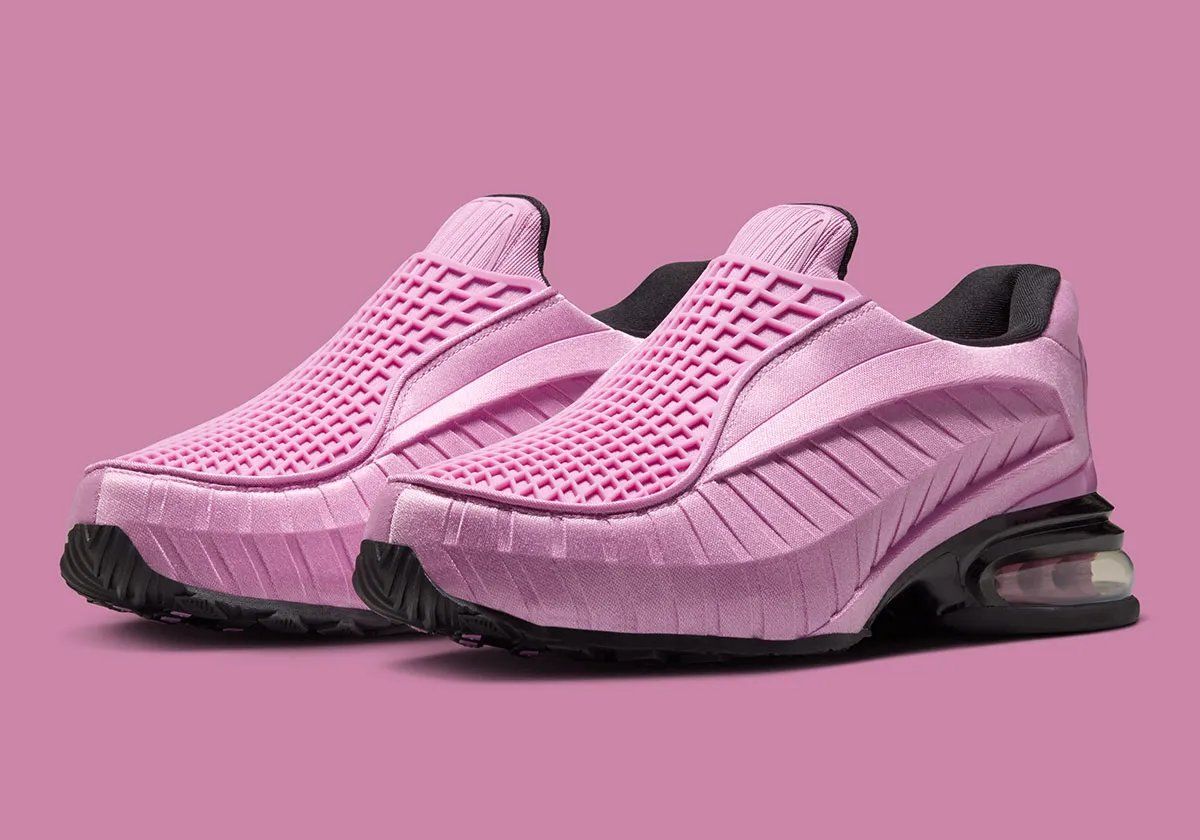 Nike Air Max Dolce Light Magenta colorway featuring gridded tongue cage, notched side panels, and translucent Air bubble sole
