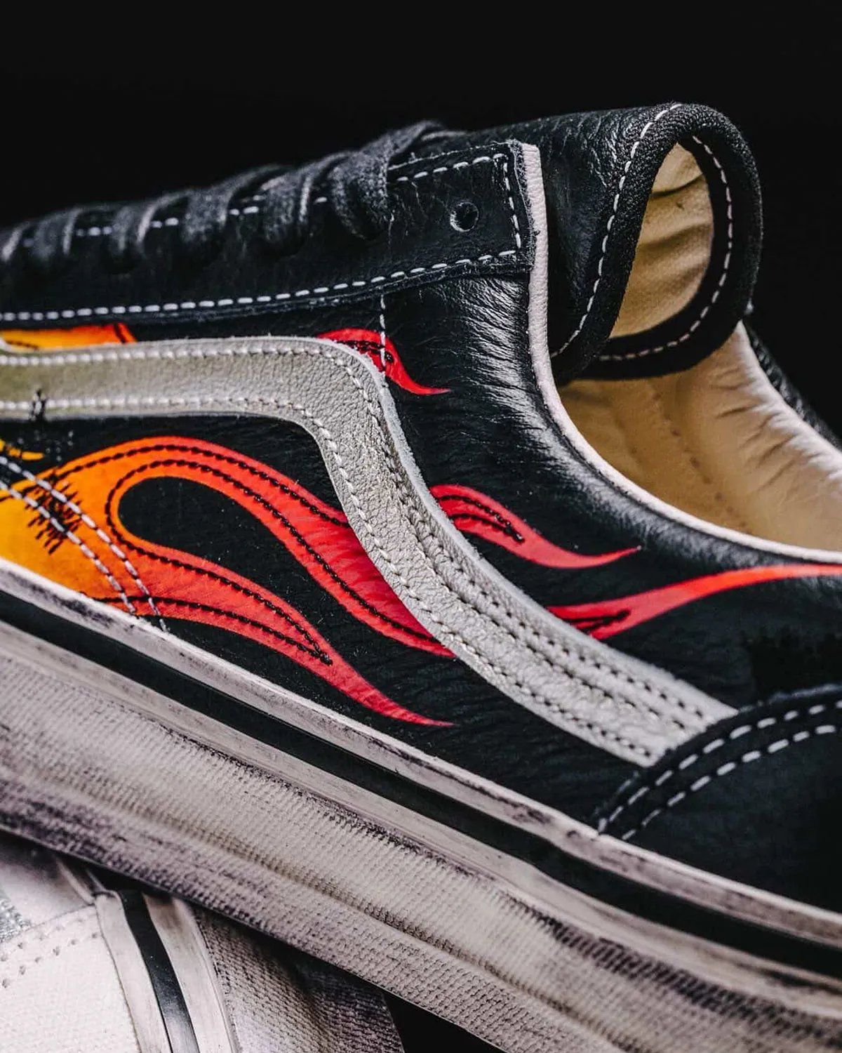 Vans Old Skool in Archive Flame colorway showing canvas upper with side stripe detail