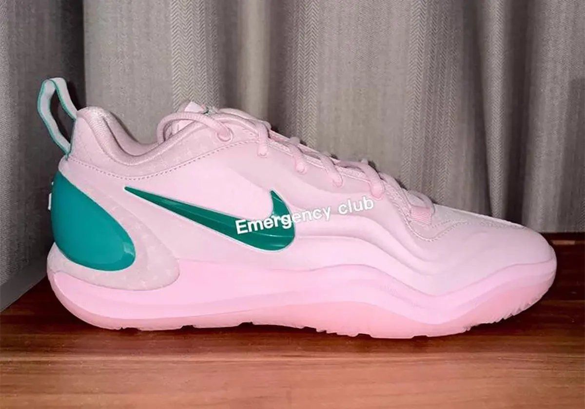 Nike A'Two MVP in pink and green colorway, featuring green heel counter and Swoosh accents with MVP pull-tab