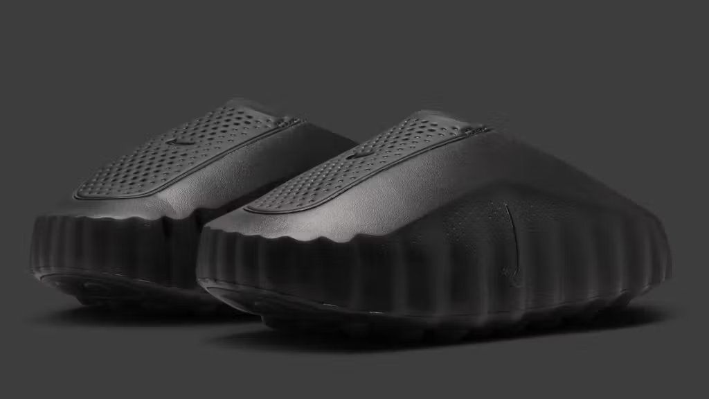 Nike Mind 001 in triple-black colorway, full side profile view