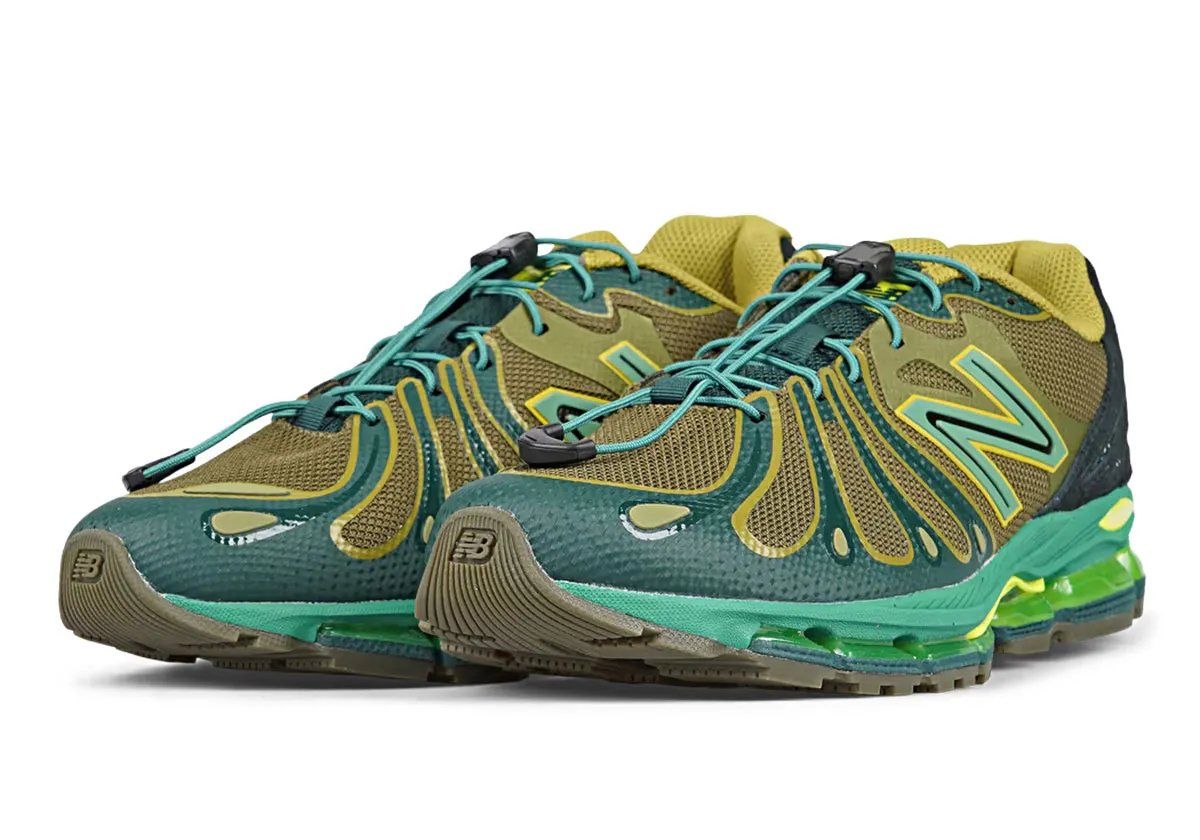 New Balance 1890 Nordic Green sneaker featuring olive, teal, and highlighter green upper with cool-toned heel counter and toe overlays