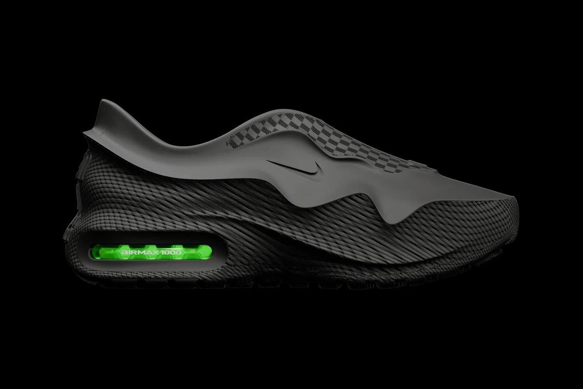 Nike Air Max 1000 in Black with Volt accents, side profile view showing updated Air Max 1 silhouette
