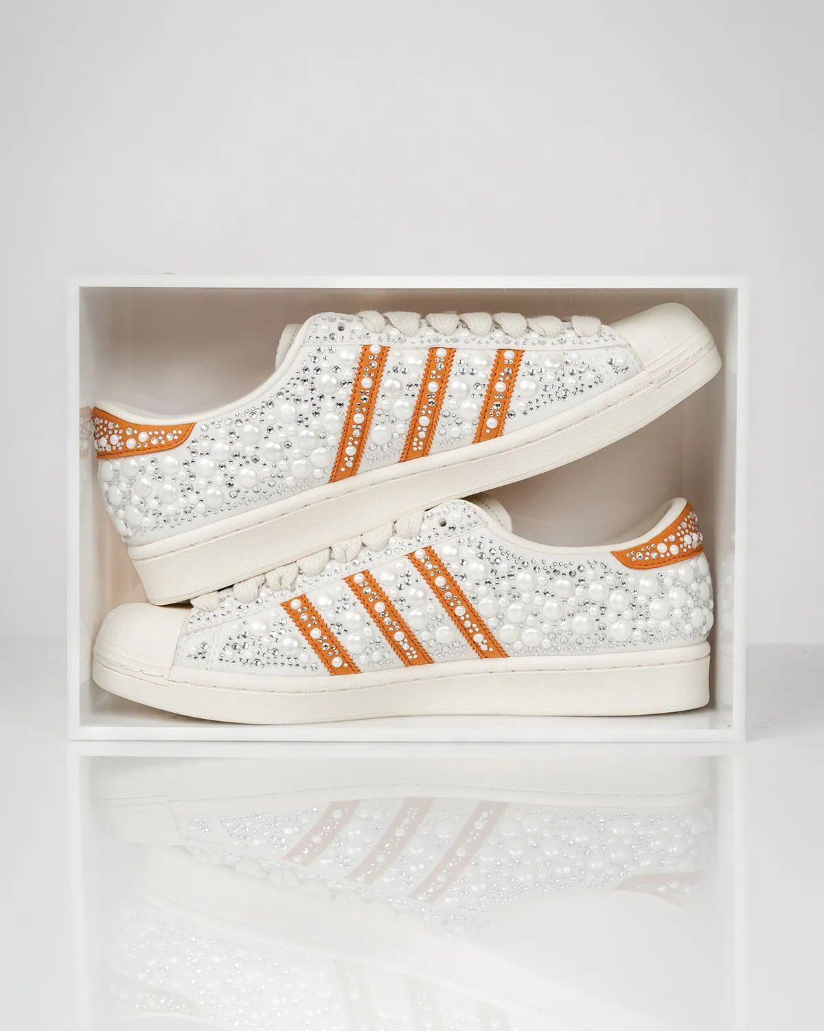 adidas Superstar in white and orange with pearlized bedazzled detailing, released for WNBA 30th anniversary