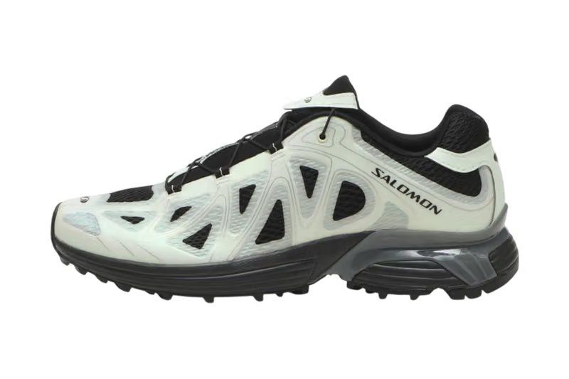 Salomon XT-WHISPER VOID in Black/Clearly Aqua colorway featuring translucent synthetic cage overlay and 3D mesh upper