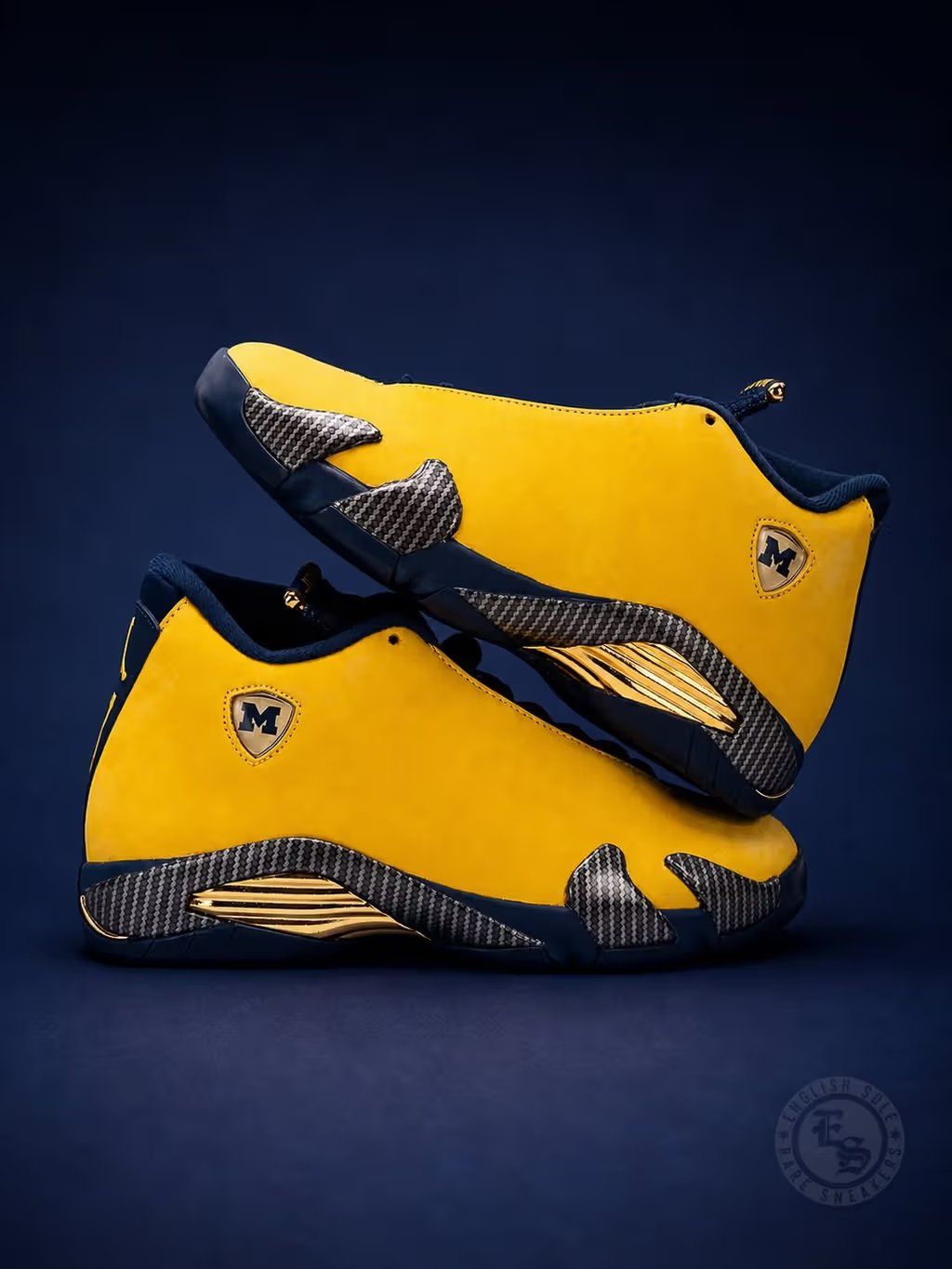 Air Jordan 14 Michigan PE in team colors, part of Jordan Brand's 2026 college program exclusive lineup
