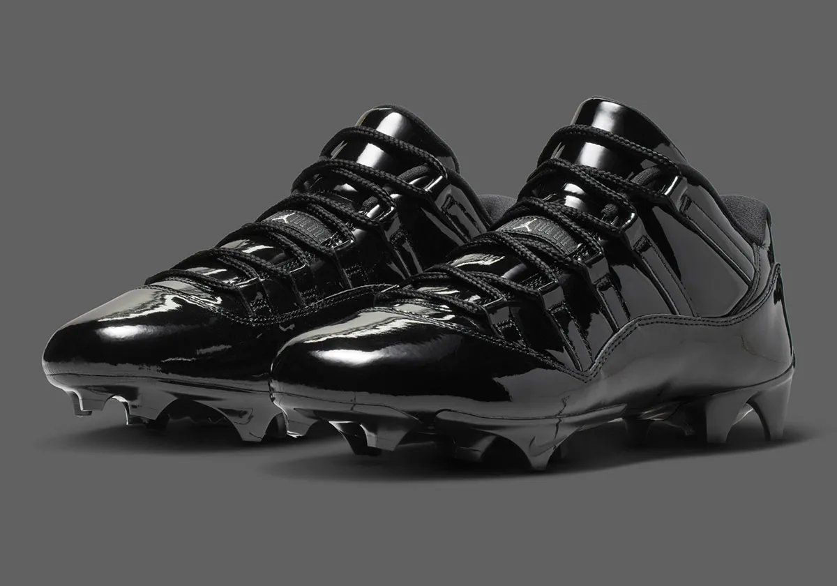 Air Jordan 11 Football Cleat in Anthracite colorway with patent leather collar and carbon fiber shank detail