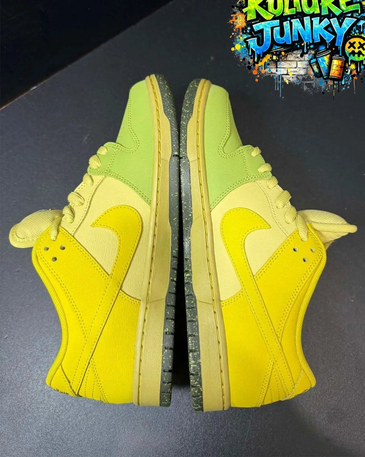 Nike SB Dunk Low in Saffron Quartz with flame graphics on the upper