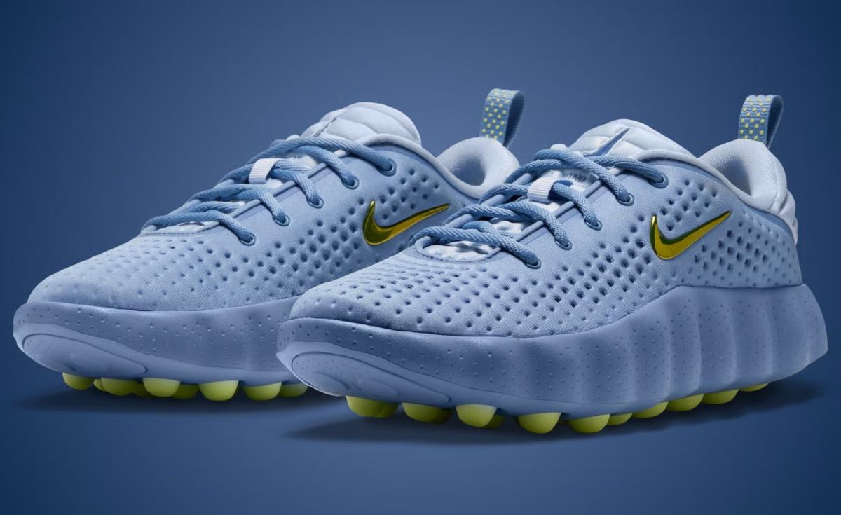 Nike Mind 002 in steel blue foam with lemon yellow accent nodes, women's silhouette