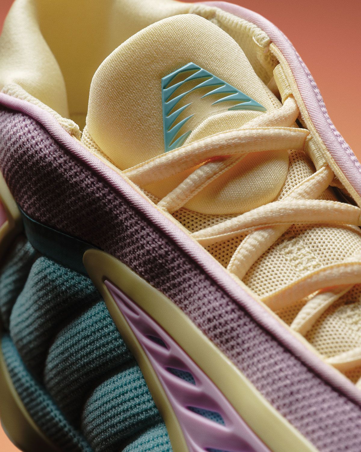 adidas Anthony Edwards 2 Easter colorway in pastel teal, yellow, and pink with fang TPU details