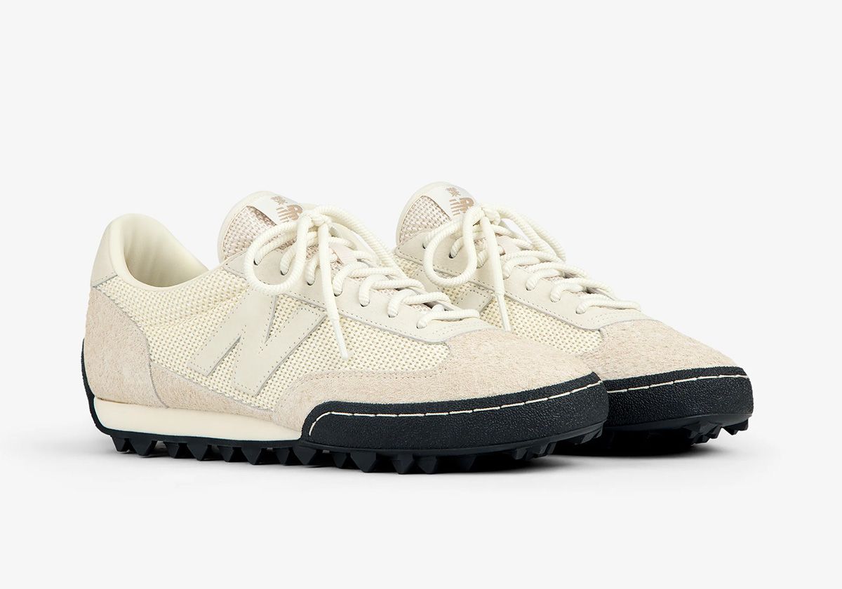 Aimé Leon Dore x New Balance Gator Run in cream mesh and suede with black sole, showing Queens branding on tongue and heel