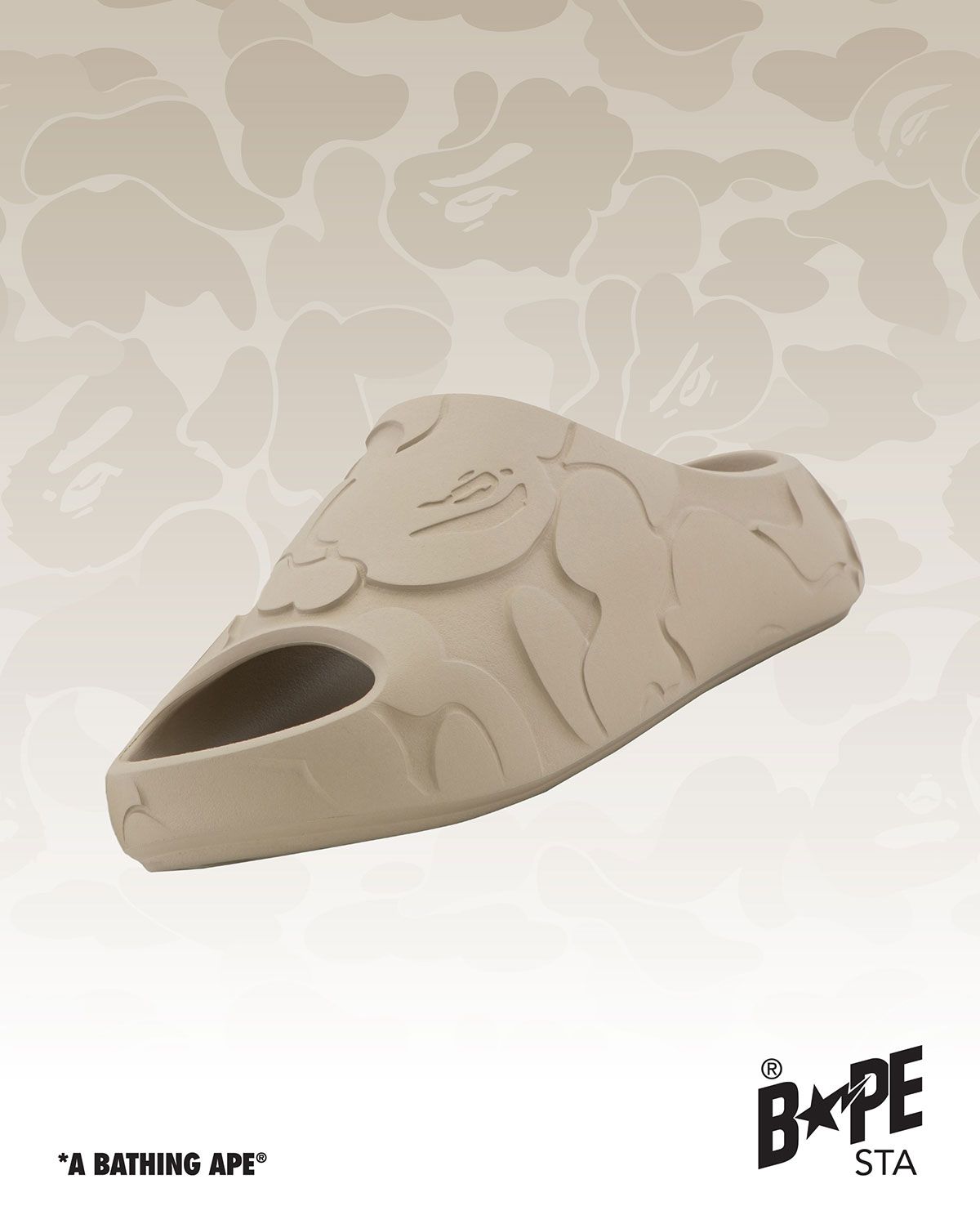 Bape slides with molded camo pattern upper and ape motif forefoot detail