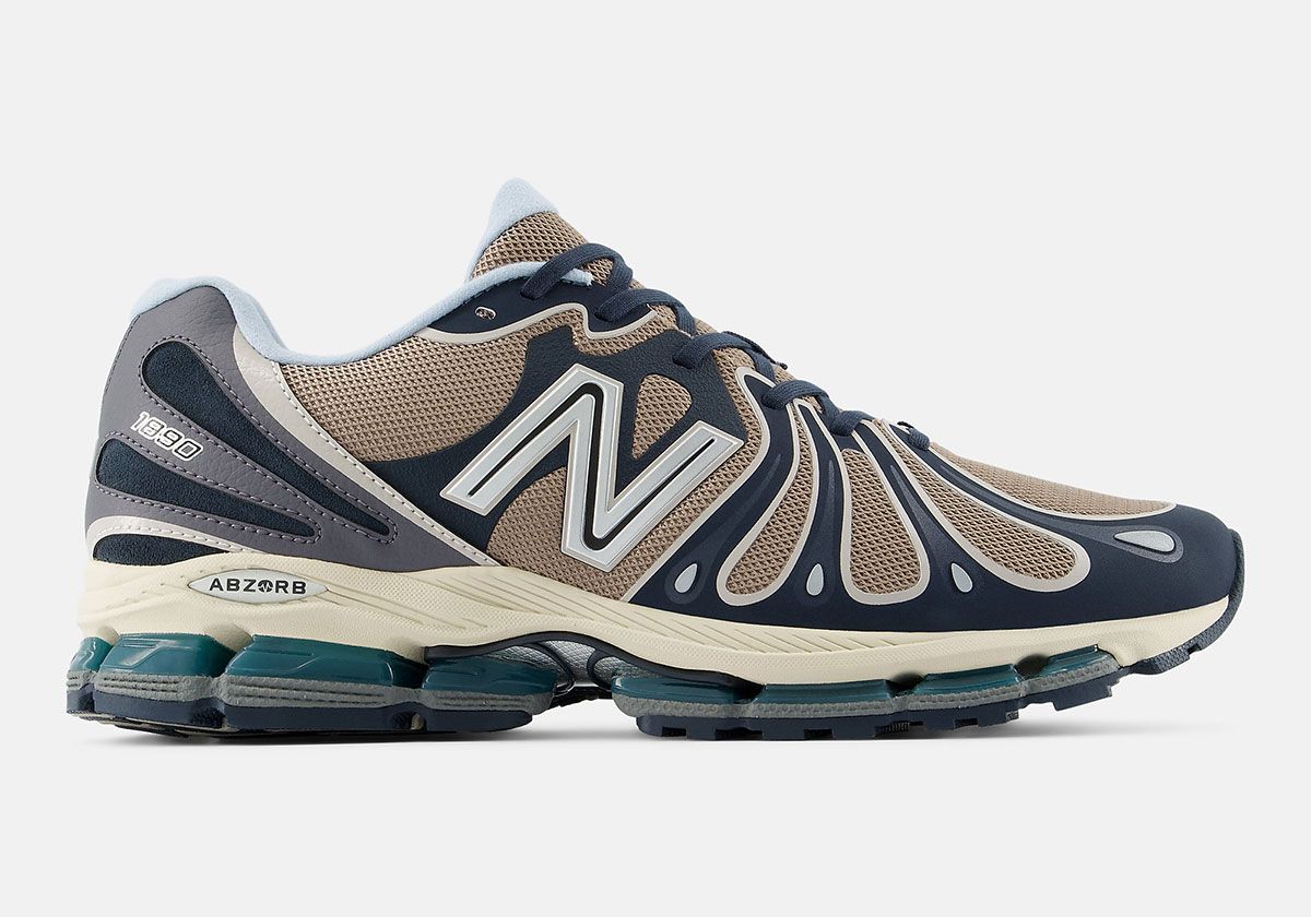 New Balance 1890 Outerspace with tan mesh upper, dark blue synthetic overlays, and teal ABZORB pods