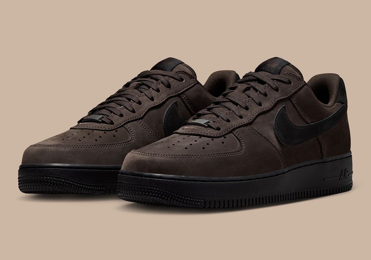 Nike Air Force 1 Low in Black Tea nubuck with minimal branding, side profile view