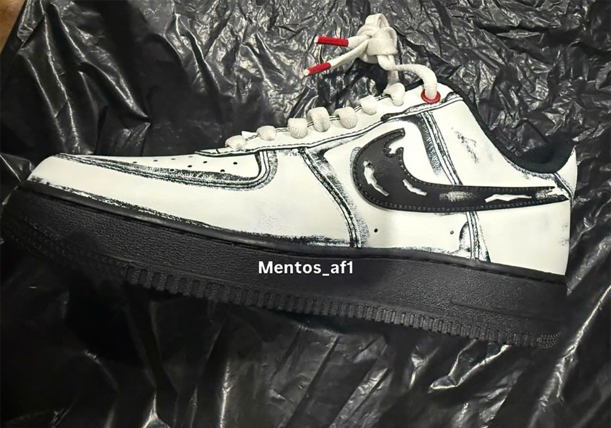Nike Air Force 1 'Scream' with distressed white leather upper and slashed black Swoosh, inspired by the Ghostface killer from the horror film franchise