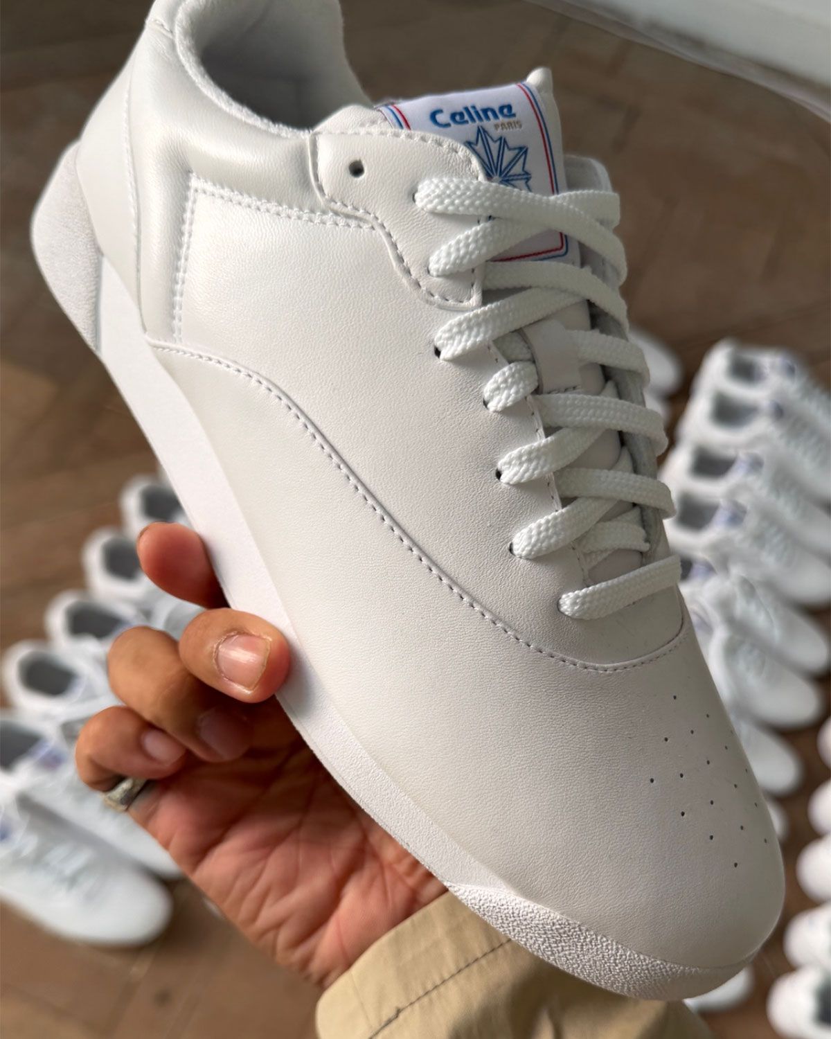 CELINE x Reebok Freestyle collaboration sneaker in premium lambskin with distressed finish and co-branded tongue label