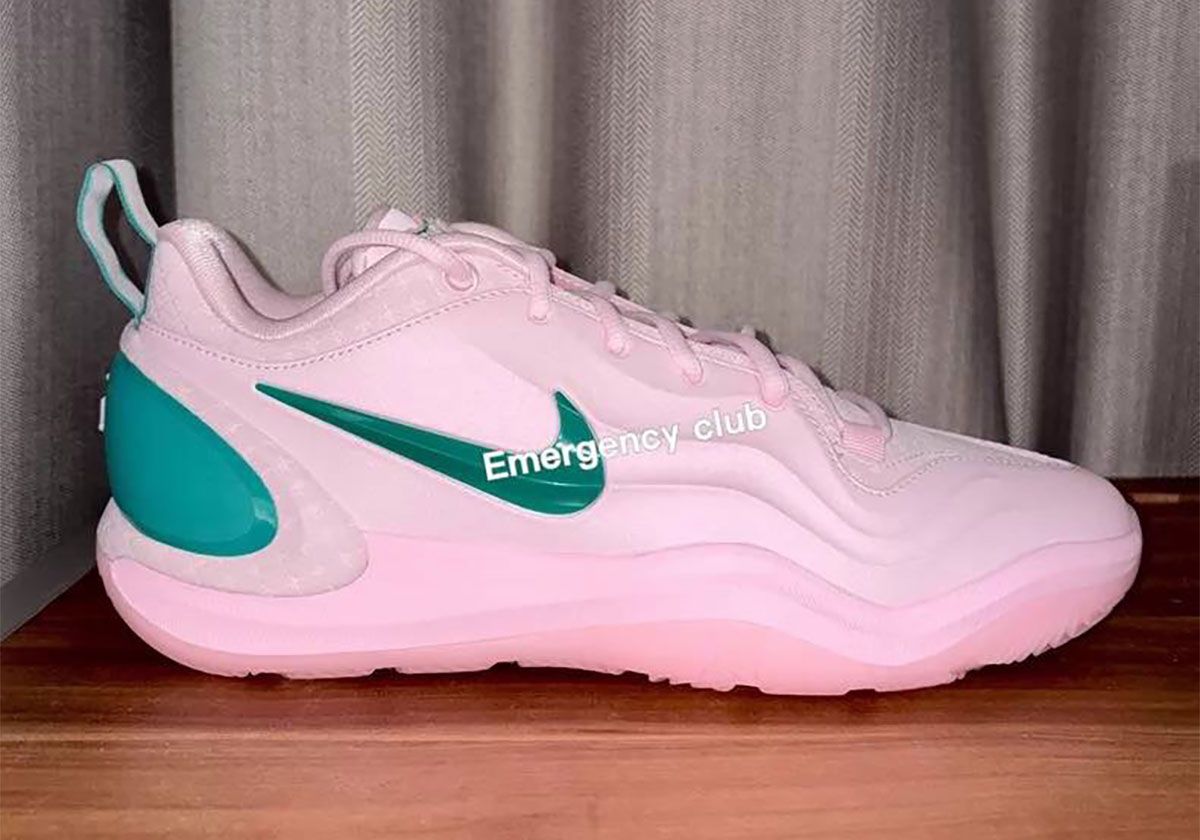 Nike A'Two MVP in pink and green colorway, featuring green heel counter and Swoosh accents with MVP pull-tab