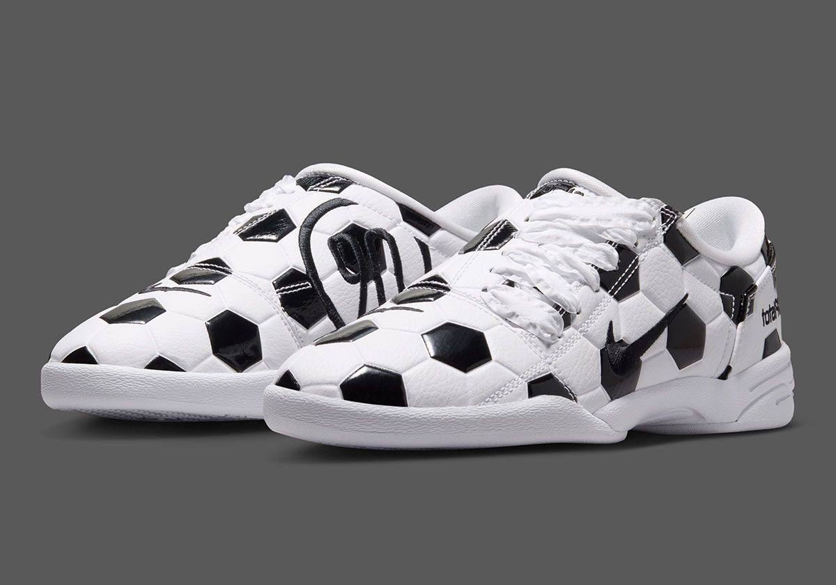 Nike Total 90 III in white with black hexagonal paneling and Dalmatian-inspired detailing, mimicking traditional soccer ball construction