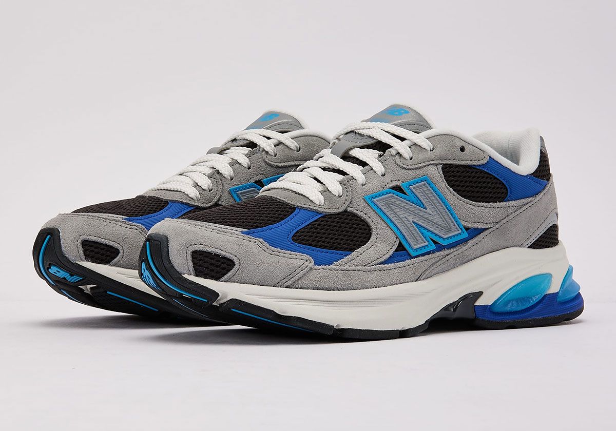 New Balance 2010 in grey suede and black mesh with royal blue and baby blue accents, retail colorway