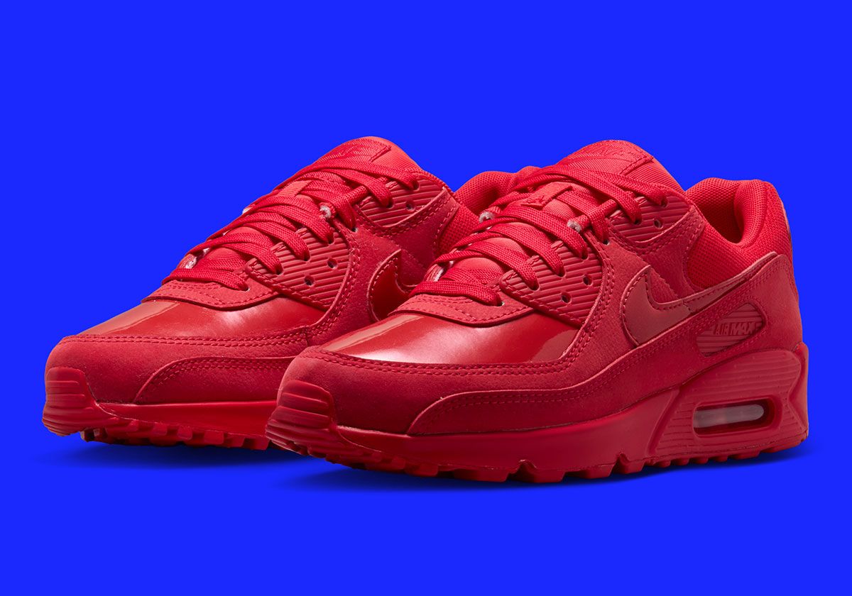 Nike Air Max 90 in monochromatic Royal Blue colorway, showing mesh upper and leather overlays in unified blue tone