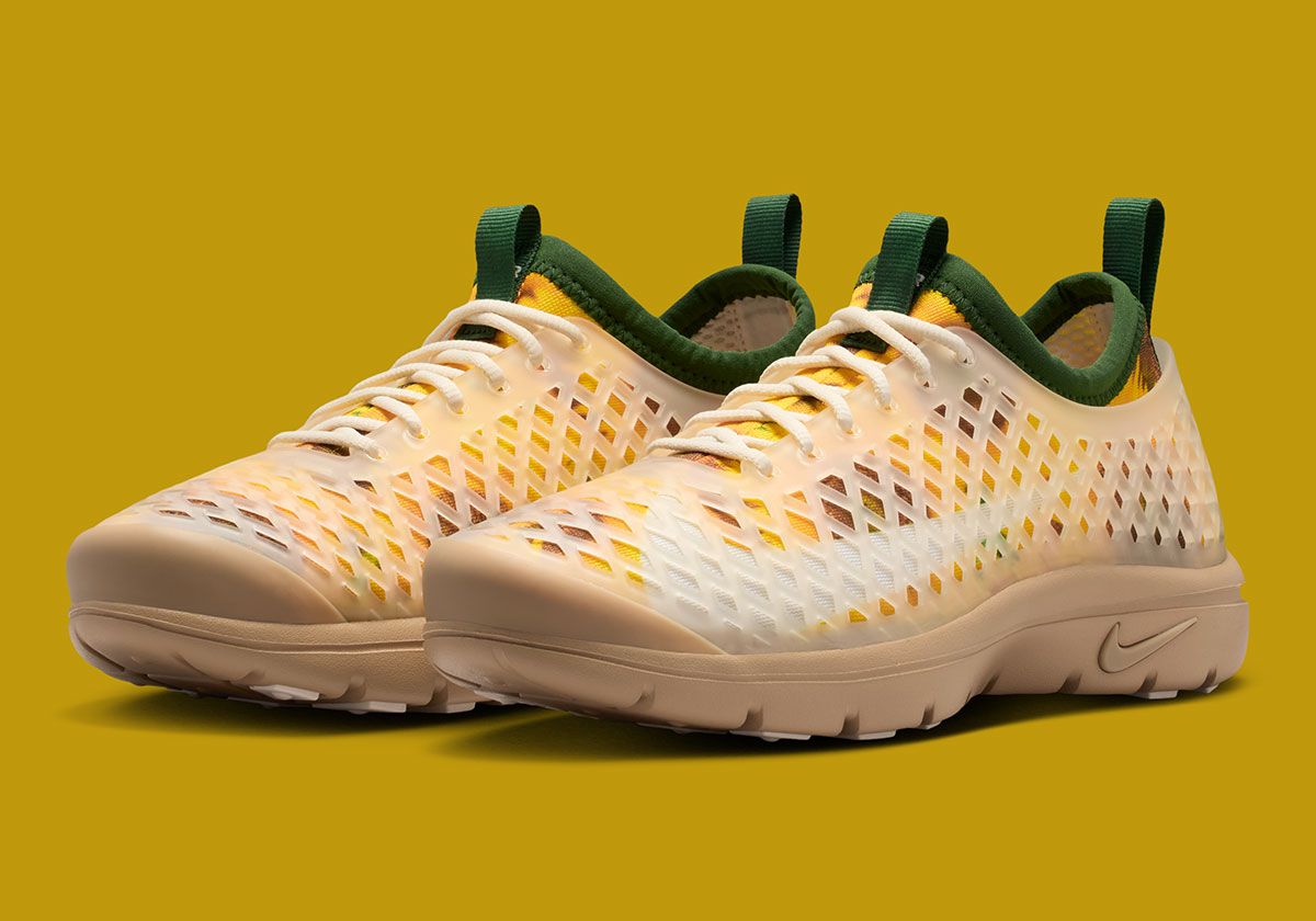 Nike Rejuven8 Run in Sunflower colorway featuring botanical graphic on breathable upper with translucent cage