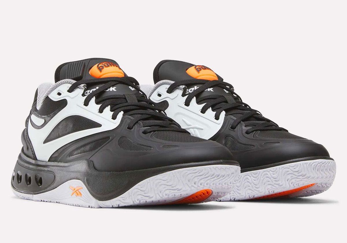 Reebok Engine A 'Pump' in black, white, and orange colorway with ERS platform cushioning