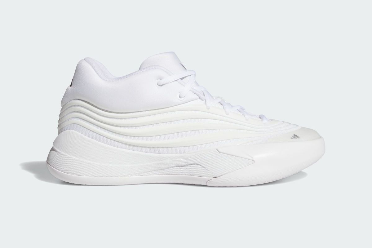 Adidas Dame X Cloud White colorway showcasing clean white leather upper and geometric side paneling