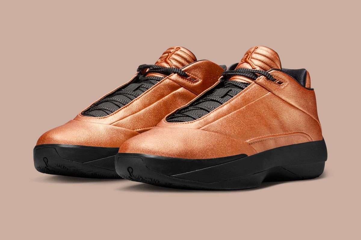 Air Jordan 40 Metallic Copper sneaker with metallic copper-toned upper panels, shown from a side profile view
