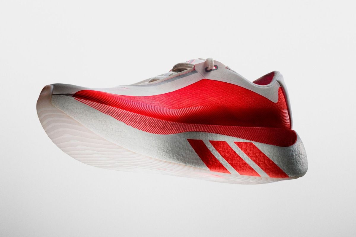 adidas Hyper Boost Edge Pure Ruby colorway, lateral and medial views showing Boost cushioning and crimson upper