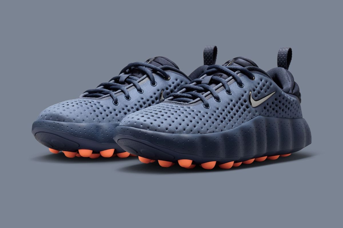 Nike Mind 002 Thunder Blue sneaker, side profile view showing the silhouette's architectural design and cool-toned colorway