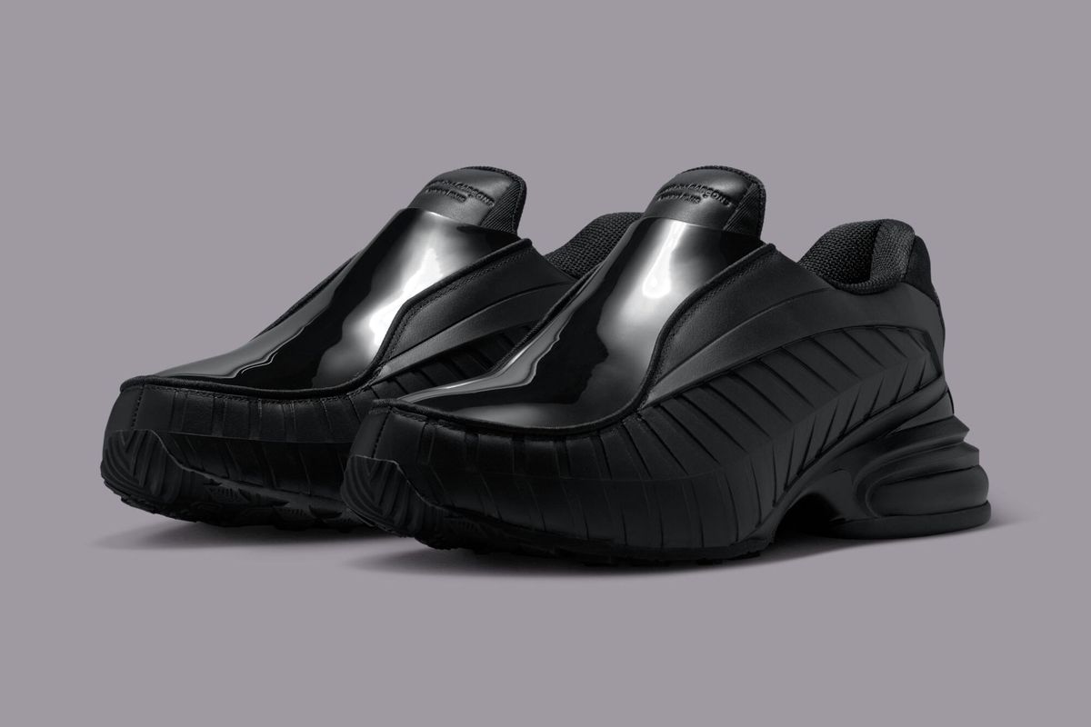 Comme des Garçons x Nike Air Max Dolce SP in Triple Black colorway, showcasing monochromatic design