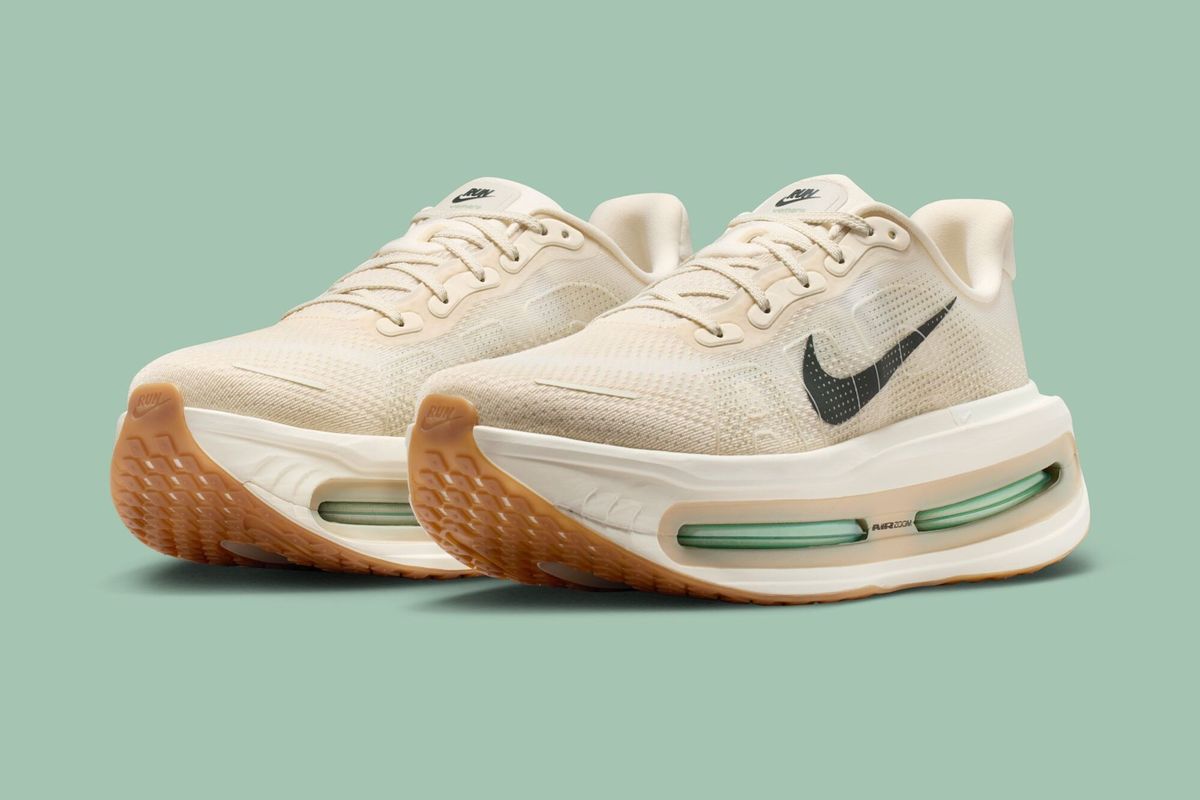 Nike Vomero Premium Pale Ivory colorway featuring neutral cream and ivory tones across the full runner silhouette