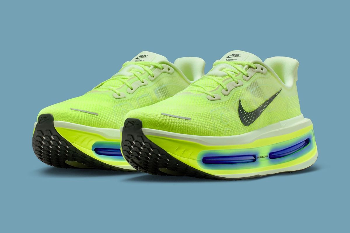 Nike Vomero Premium in Volt Tint colorway, featuring bold yellow-green accents on a premium construction upper